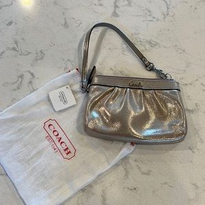 Coach wristlet shiny pewter color lilac lining NWT